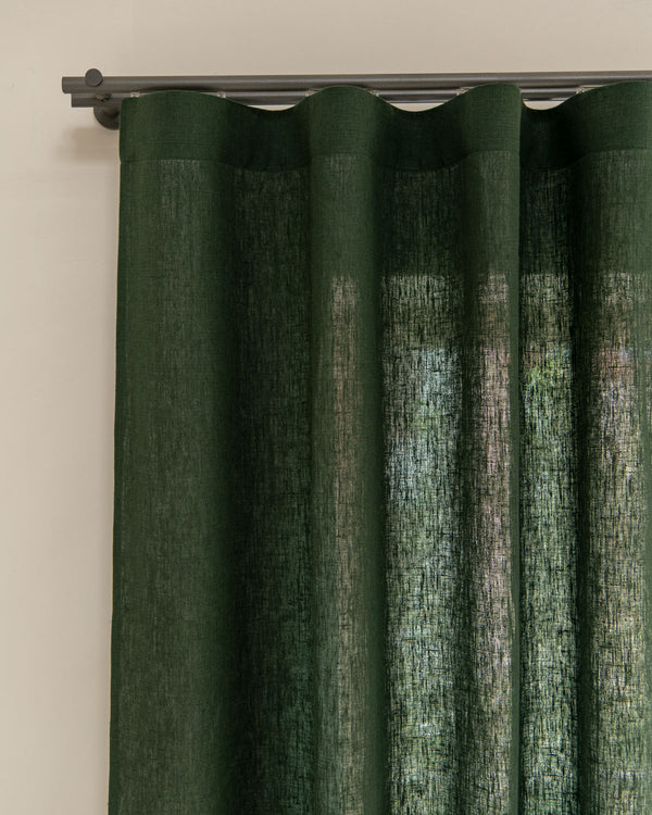 Heavy weight linen curtains in green, multi-functional heading tape.