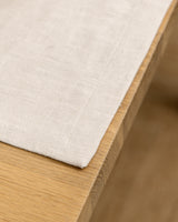 Linen table runner in beige