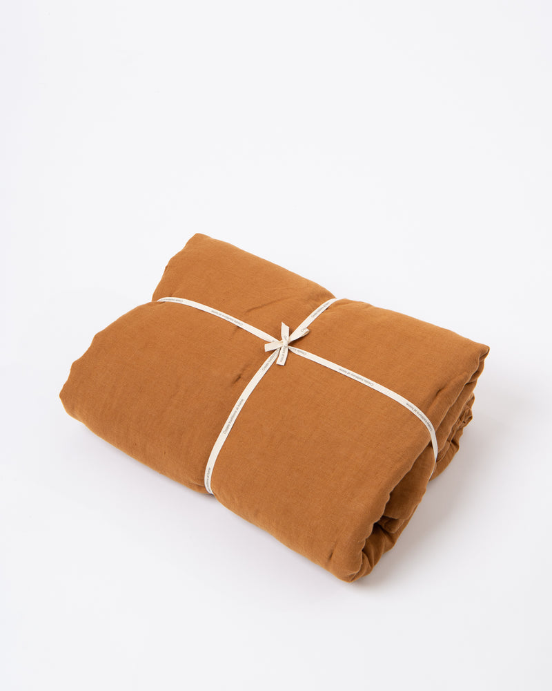 Quilted linen blanket in Cinnamon