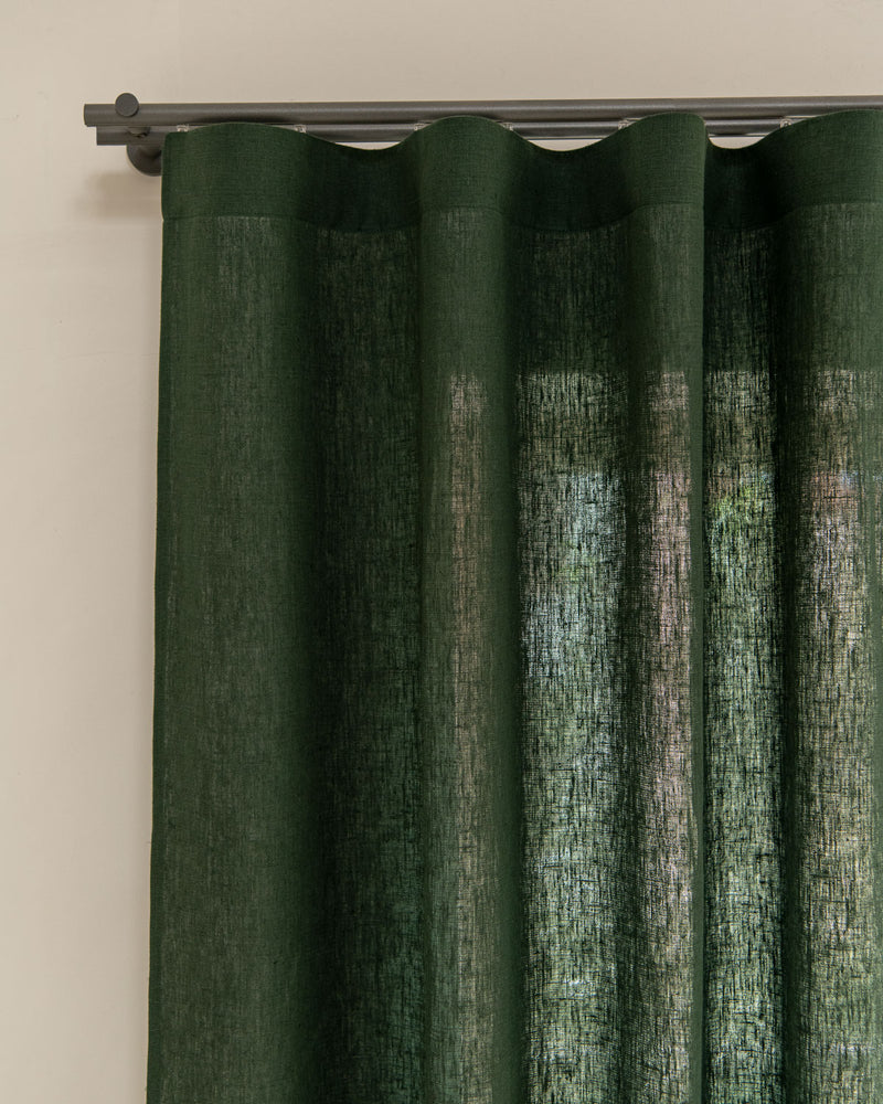 Heavy weight linen curtains in green, multi-functional heading tape.